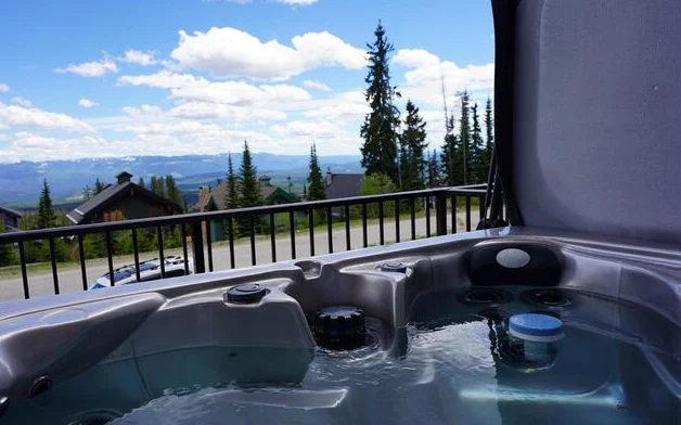 Hot tub with mountain views at 255 Raven Ridge Road #3, Big White